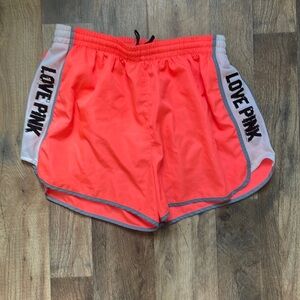 Size Medium PINK Orange Shorts with sewn in panty